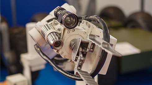 ロボットアームに取り付けるための軽量化(小型化)の光学機器